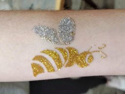 gold and silver bumble bee glitter tattoo
